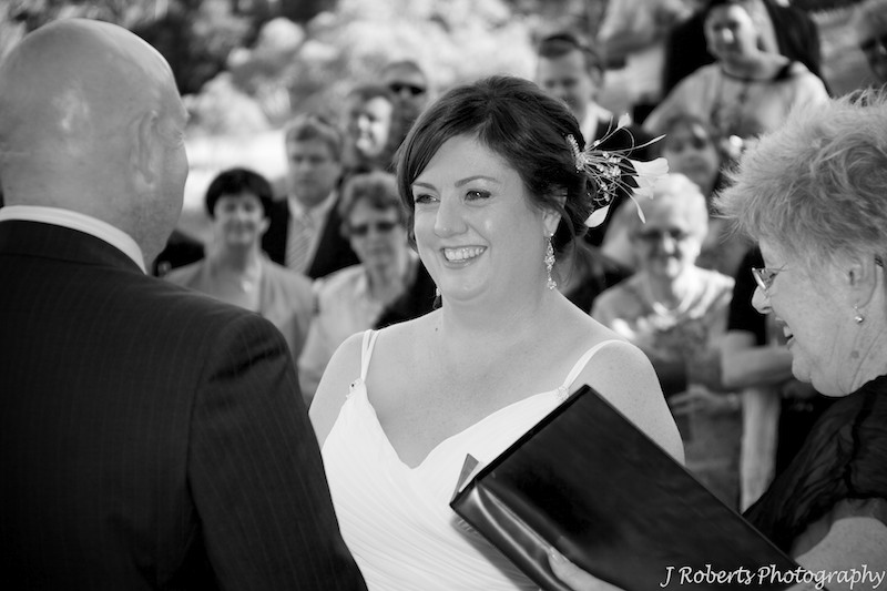 Bride laughing during ceremony - wedding photography sydney
